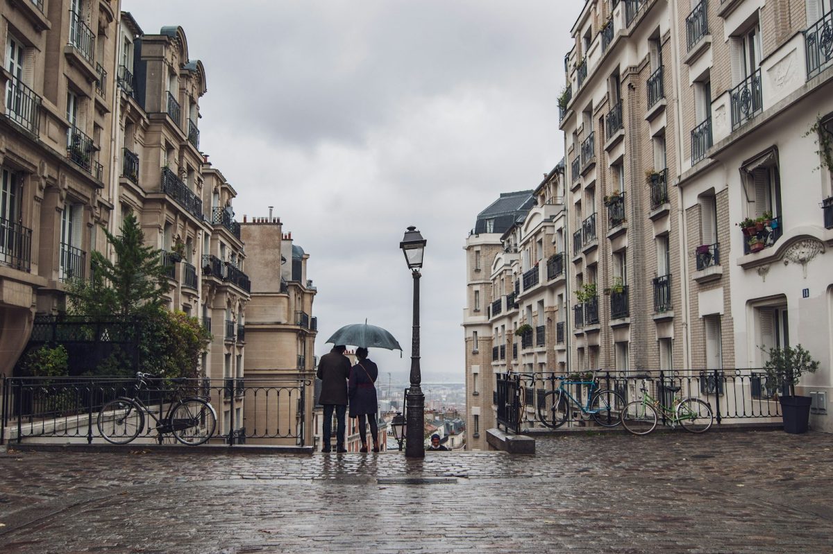 Romantic secret viewpoint and cobblestone streets overlooking Paris